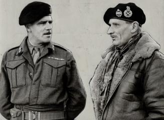 Over-all command of the U.S. First and Ninth Armies has been given Marshal Montgomery, who is directing the assault on the Ardennes bulge. He is seen (...)