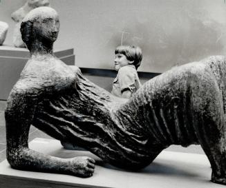 Just resting. School children from across Metro seem to enter into the spirit of the Henry Moore Gallery at the Art Gallery of Ontario, as John Hutchi(...)