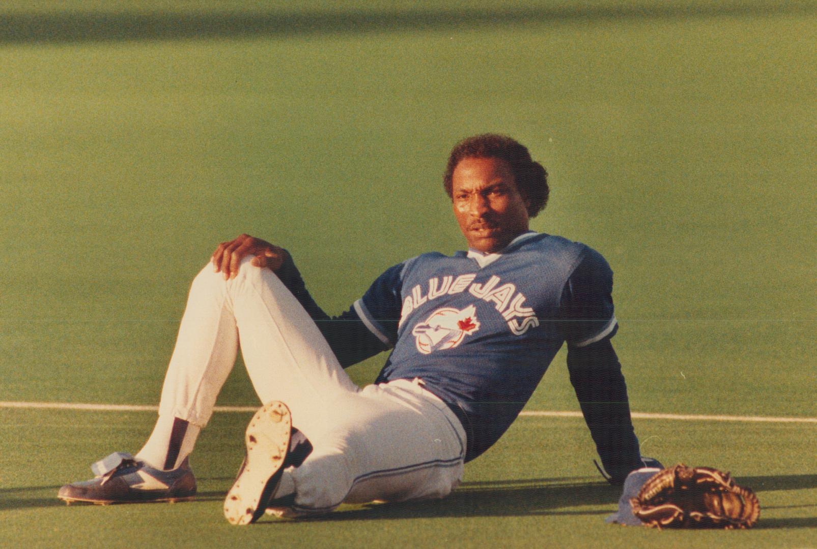 Jay's outfielder Lloyd Moseby seems to be staring off into space while he takes a break just hours before last night's crucial game