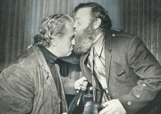 Celebratory kisses were in order last night as poet Irying Layton (left) and prose writer Farley Mowat vied to accept congratulations from Toronto's l(...)