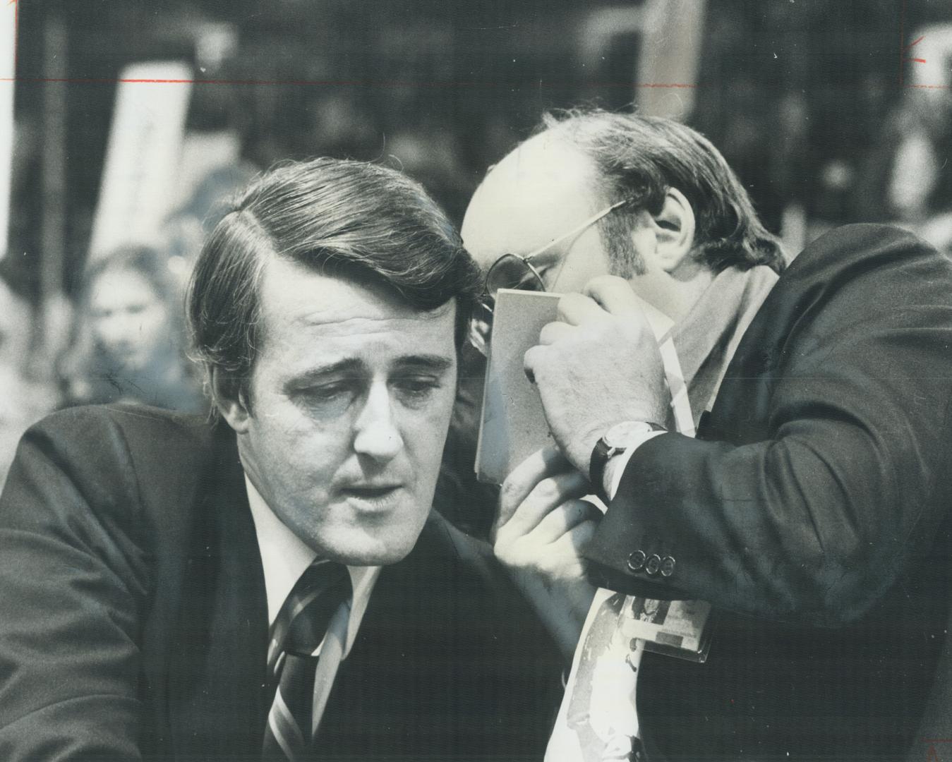 Brian Mulroney, conferring with aide during leadership race he lost to Joe Clark, is touted as cabinet material
