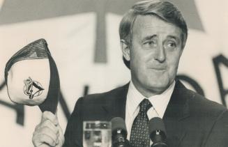 Hats off: Mulroney gives a Jay wave and several election hints
