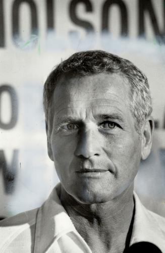 When strangers are about, Paul Newman keeps his glasses on
