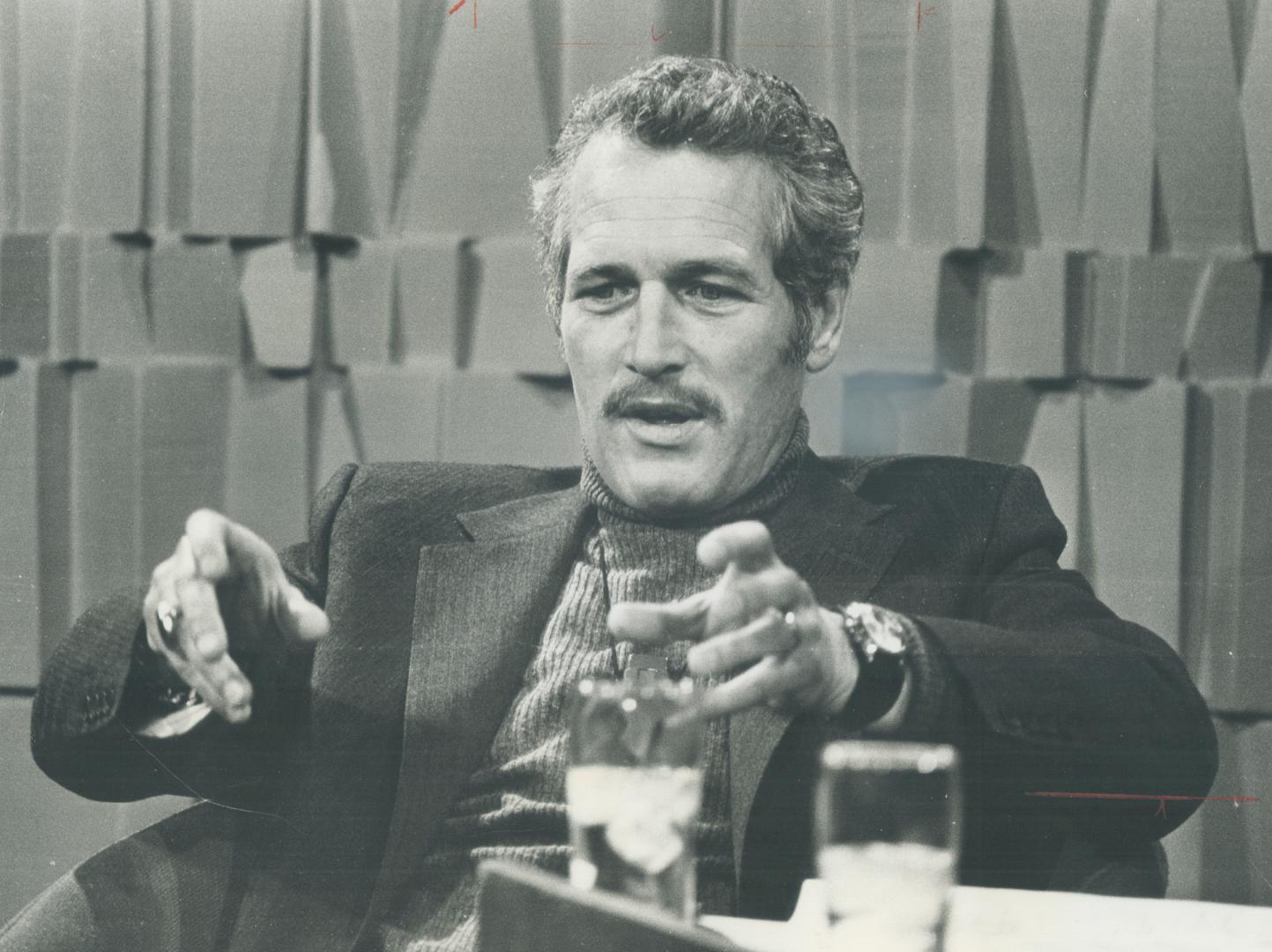 Paul Newman, moustachioed and older, still exudes sex appeal