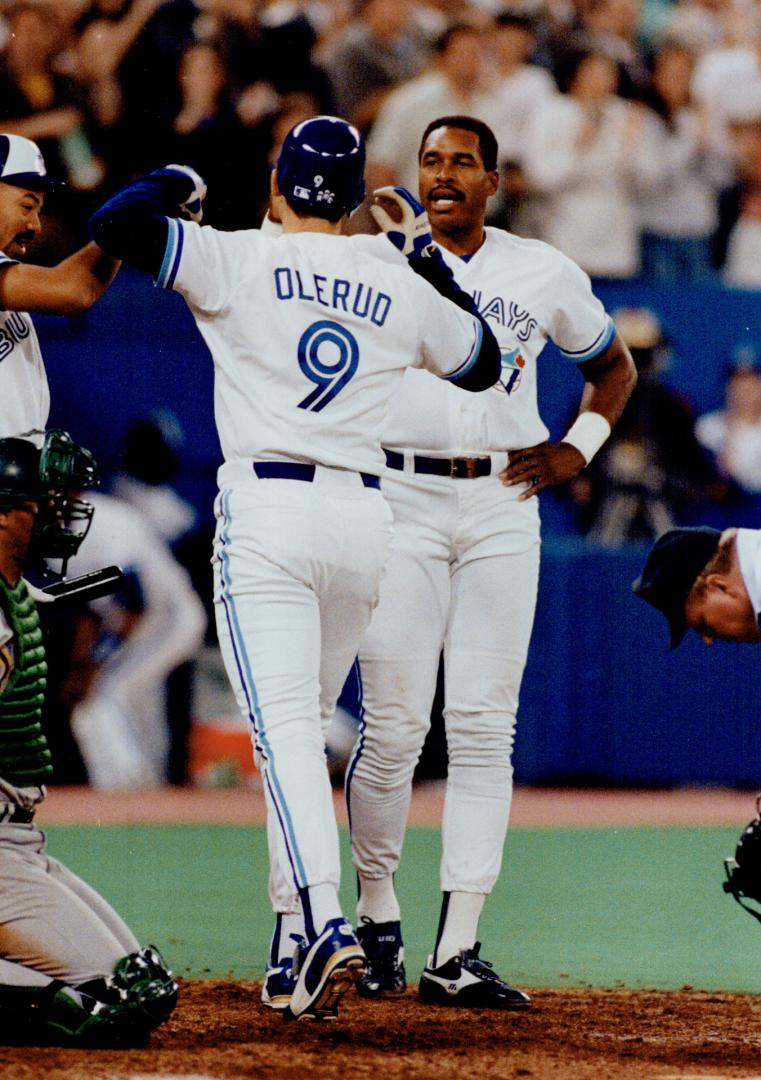Big blow, Jays' John Olerud is met by Dave Winfield after his homer – All  Items – Digital Archive Ontario