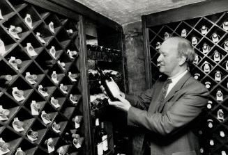 Top, Walter Oster's wine cellar, complete with spiderwebs
