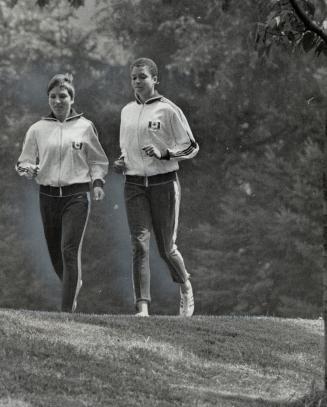 Daily jogs are part of the serious training for the girls who hope to bring some medals home from the Olympic Games in Mexico. [Incomplete]