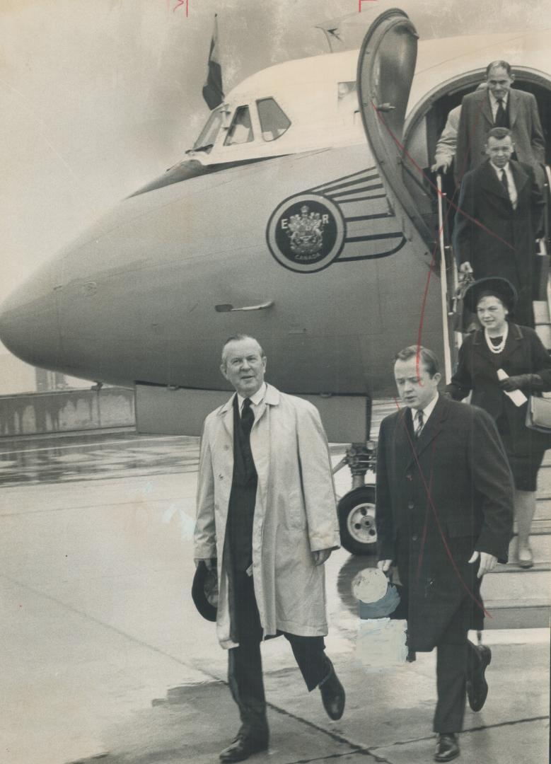 Prime Minister Pearson arriving in Toronto yesterday