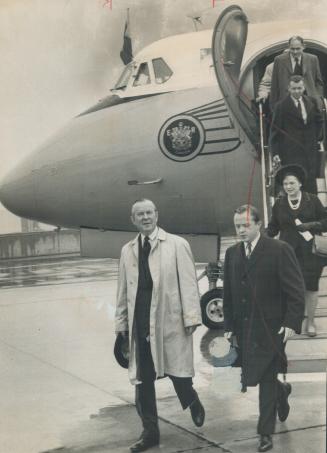 Prime Minister Pearson arriving in Toronto yesterday