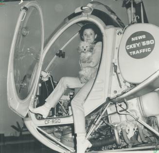 Traffic girl Dini petty takes to air in her pink helicopter
