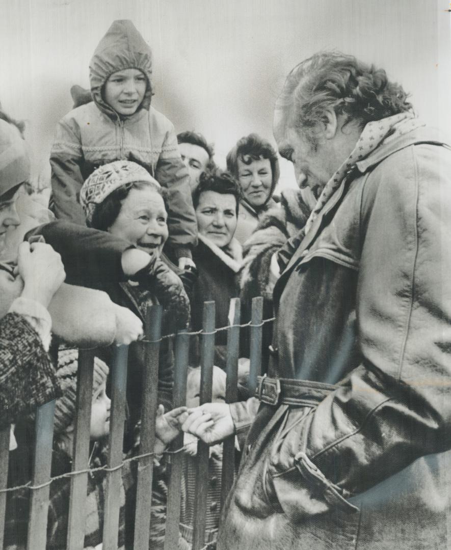 Throng of children greet Prime Minister Pierre Trudeau today as he arrived by helicopter at Brantfoprd's Pauline Johnson High School