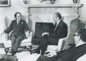 In a low-key conference in the Oval Office of the White House, Prime Minister Pierre Trudeau talks with U