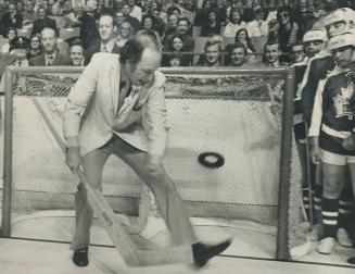 You win some, you lose some, and Prime Minister Pierre Trudeau, out-manoeuvred, lets this shot zip past him as he takes a brief spell in the goal net (...)