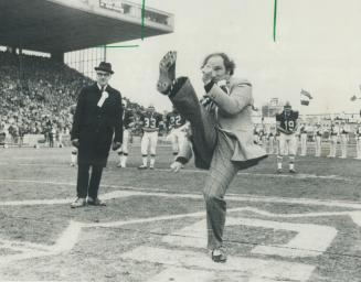 A 25-yard kick by Prime Minister Pierre Trudeau launches the 1970 Grey Cup game today