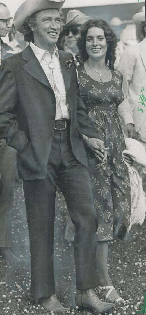 Margaret Trudeau, 22, shown with her husband, Pierre, 51, at Calgary Stampede earlier this year, is pregnant