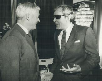 Eye to eye: Liberal leader John Turner, spoke to Toronto Liberals yesterday, greets his Ontario counterpart, David Peterson, wearing an eyepatch because of an eye infection