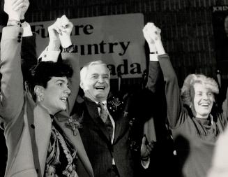 High hopes: Turner basks in applause with Hamilton East MP Sheila Copps, far left, and wife Geills