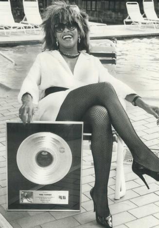 Queen of raunch holds court. Who could mistake those legs, barely hidden by fishnet stockings? When Tina Turner comes to town everybody knows it. She (...)