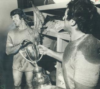 The triumphant moment when the cup was secured meant a splash of champagne and memories to Wade