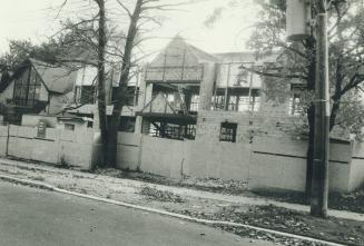 The unfinished Forest Hill dream home, above, owned by a numbered company in the name of White's wife, Doris, was on sale last week