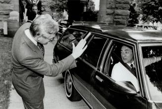 See you soon, Governor. Premier Bob Rae waves goodbye to New York Governor Mario Cuomo yesterday after a meeting at Queen's Park. Both men traded view(...)