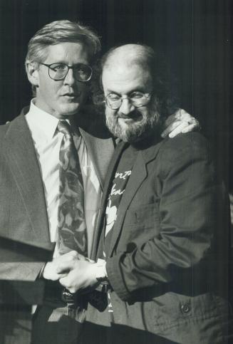 Surprise visit: Salman Rushdie, right, is greeted by Ontario Premier Bob Rae at Pen writers' benefit at Winter Garden Theatre last night