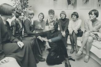 Hair stylist Vidal Sassoon is shown with girls who modelled his hairdos this week at his Avenue Rd