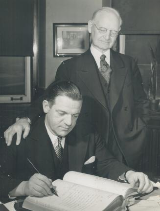 Robert H. Saunders with Jas W. Somers