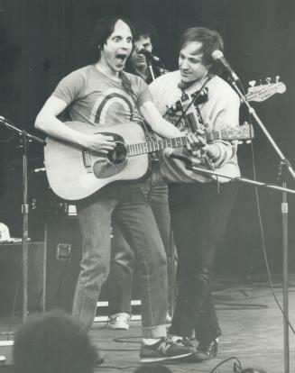 Kid-at-heart: Bob Schneider (left) and the Rainbow Kids entertained children with high-spirited, fun-filled music that was familiar to any school kid in Metro