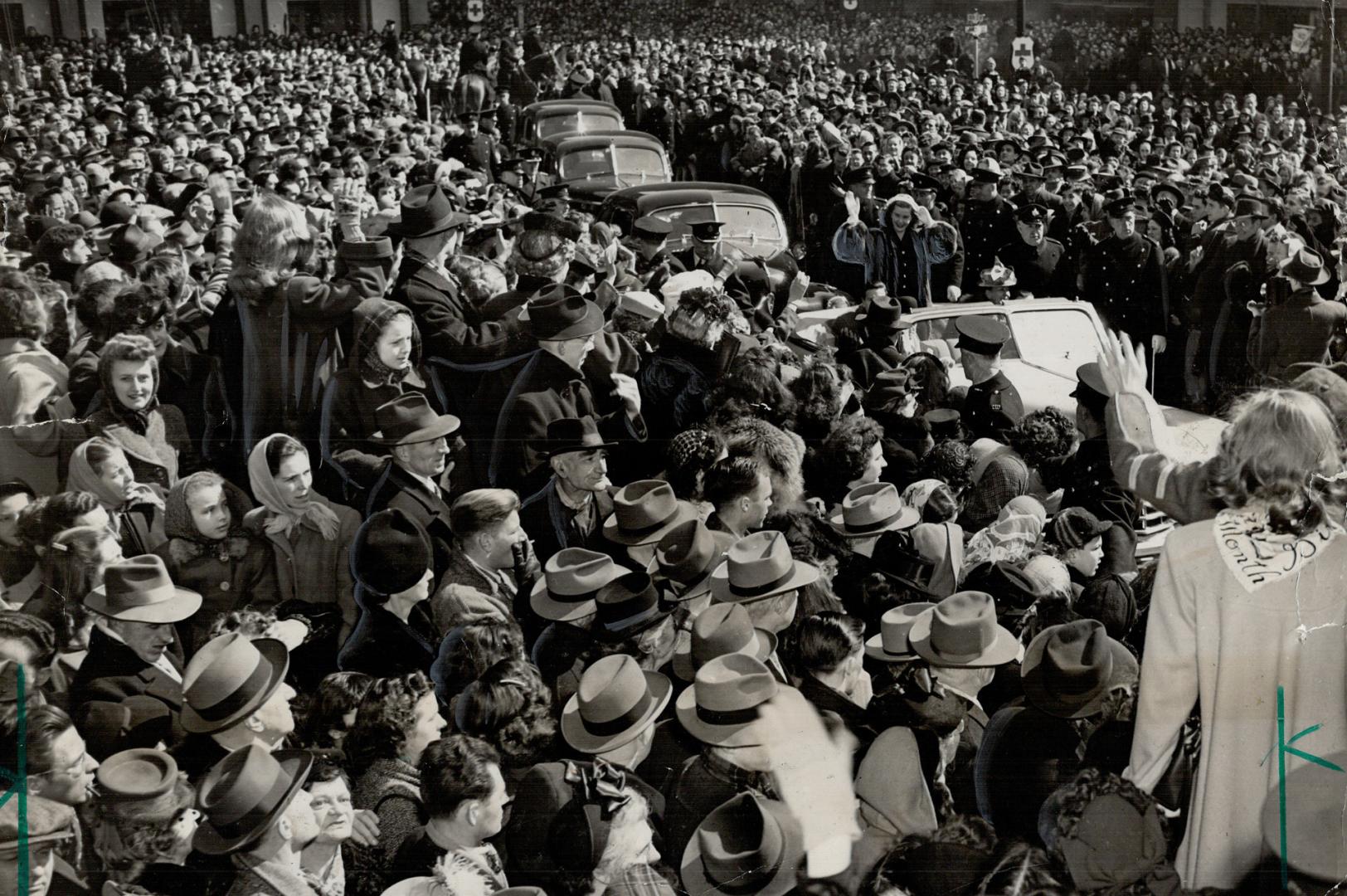 All day long Toronto paid homage to Barbara Ann starting with her triumphal procession to the city hall where she is seen as she arrived by motor. Hug(...)