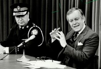 Big spenders: Energy Minister Bob Wong, left, and Attorney-General Ian Scott pushed spending laws close to the limit in the 1987 election
