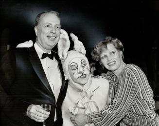 At opera hop: The bunny (Michael Howell) hugging leady Judith Forst and Robert Baillie, chairman of the Canadian Opera Guild, warmed up guests at the guild's Ice House party last night, after the opening of Massenet's Werther.