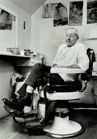 Changed times: The girlie pictures will soon be off the wall of Andrew Beierle's Sherbourne St. shop, as the 82-year-old barber hangs up his shears after 70 years in business.