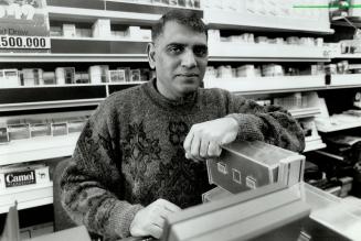 Yahya' Coovadia: After 22 years as a convenience store owner, he's thinking of installing an electronic door to better screen late-night customers.
