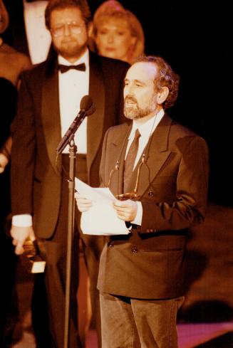 Producer Arnie Gelbart accepted award for The Vaiour And The Horror for Brian and Terry McKenna, who made controversial documentary.