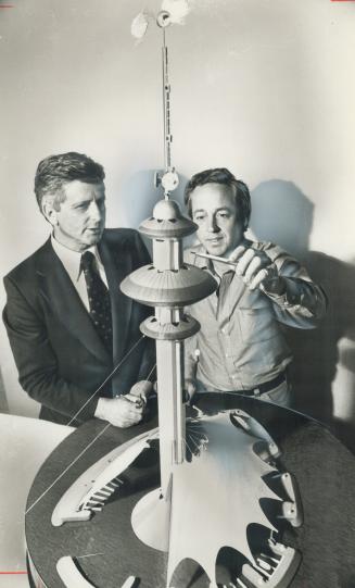 Tallest export?, Malachy Grant, left, designer of Toronto's CN Tower, and Edward Baldwin, architect, display their entry in an international design competition for a tower for tiny oil-rich Abu Dhabi