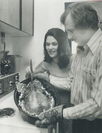 Mr. and Mrs. Gary Jackson. Turkey cooked by his recipe