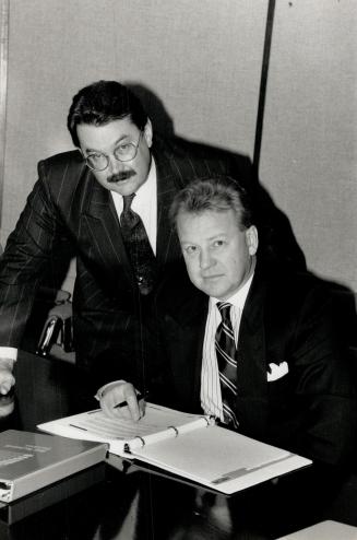 At your service: Consultants John Ingram, left, and Bob Nihill helped make history at Kodak Canada