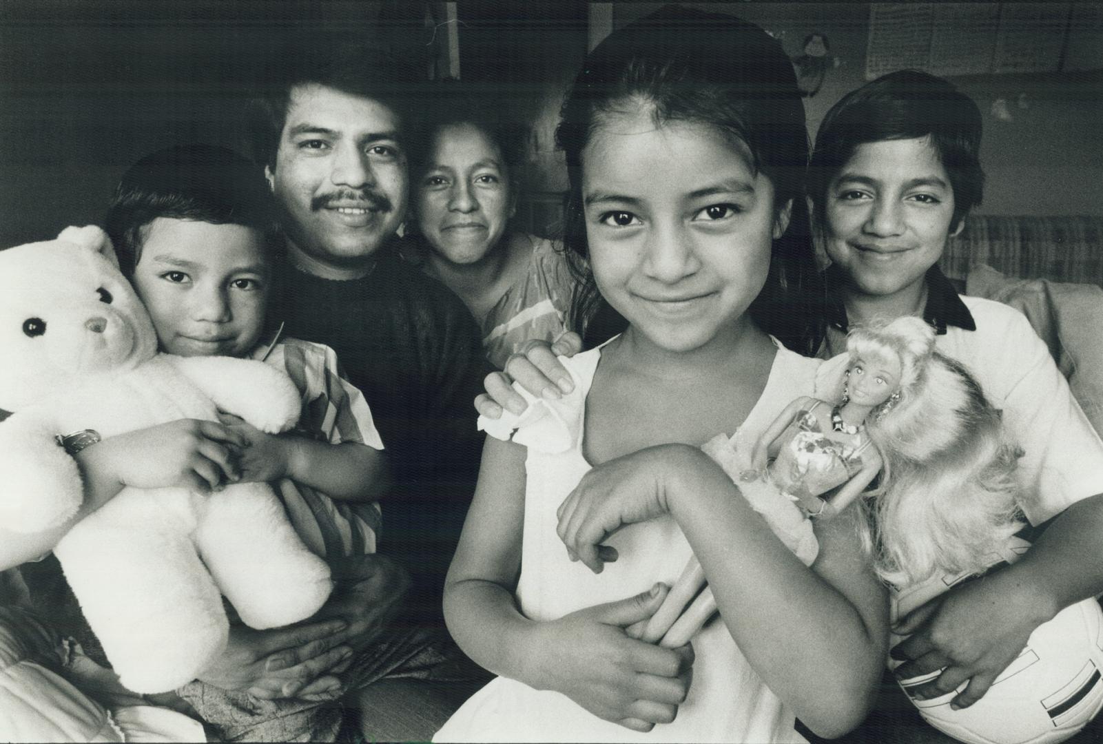 Reunited Family: from left, 5-year-old Walter Lopez, with parents Ignacio and Amalla, and siblings Norma, 7, and Maroio, 12.