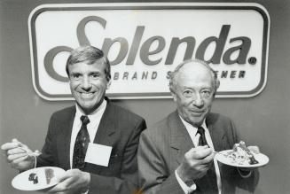 Sweet news: Murray McEwen, Redpath chairman, right, and Ian Knight, director of external affairs, sample some cherry cheesecake made with Splenda.