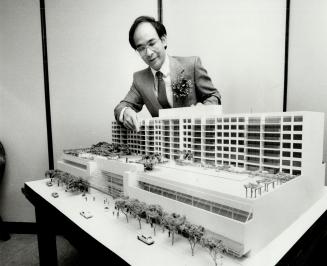 Booming Chinatown: Developer Tim Man (above) points to a model of Chinatown Centre, to be built by 1987.