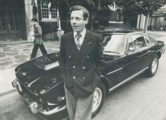 George Minden and his Aston-Martin: 'A feeling of little man, big car'. George Minden is the Greta Garbo of Toronto millionaries. [Incomplete]