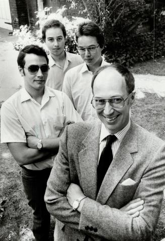 Alan Osler with sons (from left) Benjamin, 19, Geoffrey, 15, and Daniel, 17. He is professor of English at York University.