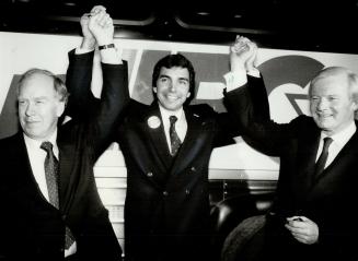Declared winner: A happy Jeff Rice is flanked by Ontario Premier Frank Miller on the left and Miller's predecessor William Davis after he learns of his successful bid to hold the high-profile Brampton riding for the Tories
