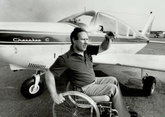 Freedom on wings: Pilot Kirby Rowe is confined to a wheelchair after crushing his legs in a plane crash.