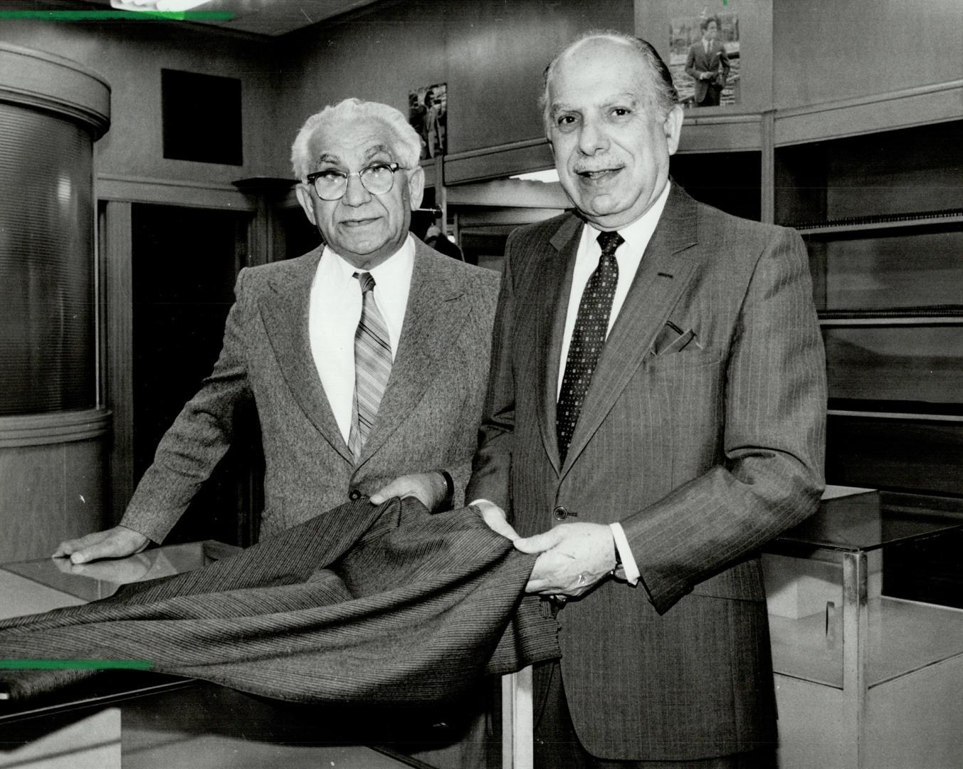 A stitch in time: Max Ruben (left) and his brother Gordon stand in the tailor shop their father opened 68 years ago.
