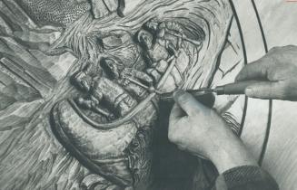Intricate detail of Basil Self's carving is shown in this close-up of him putting the final touches to a scene of voyageurs shooting the rapids