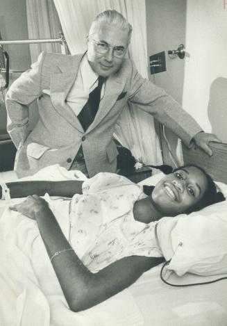 Dr. Edward Simmons visits his 14-year-old patient, Nola Pinney