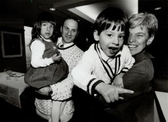 Schafer Family: Reva and Kenneth Schafer, who adopted Peruvian infants Eli and Jordana in November, 1990, when Eli was ill, neede extra time with him