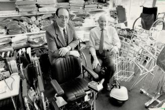 Healthy enterprise: Lou Starkman, right, a veteran of the health care business who graduated from the Ontario College of Pharmacy in 1931, and company manager Jim Garde, believe it takes more than just wheel chairs, commodes and walkers to make a good health care store